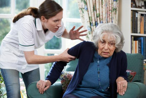 elderly women experiencing nursing home abuse